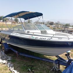 1986 FOUR WINNS BOAT AND TRAILER 