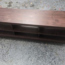 Brown wooden TV stand