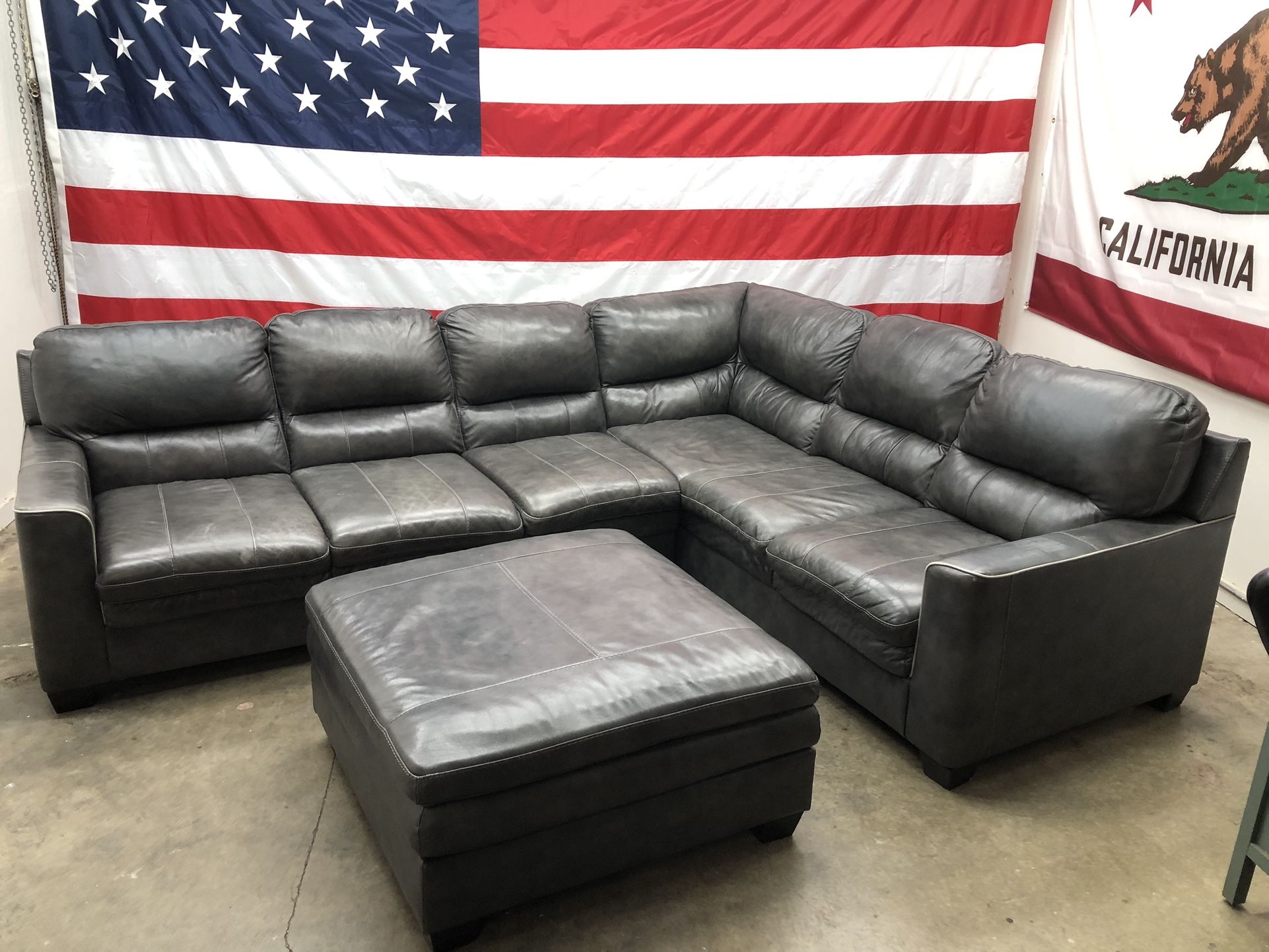 Free Delivery - Grey Leather Sectional & Ottoman