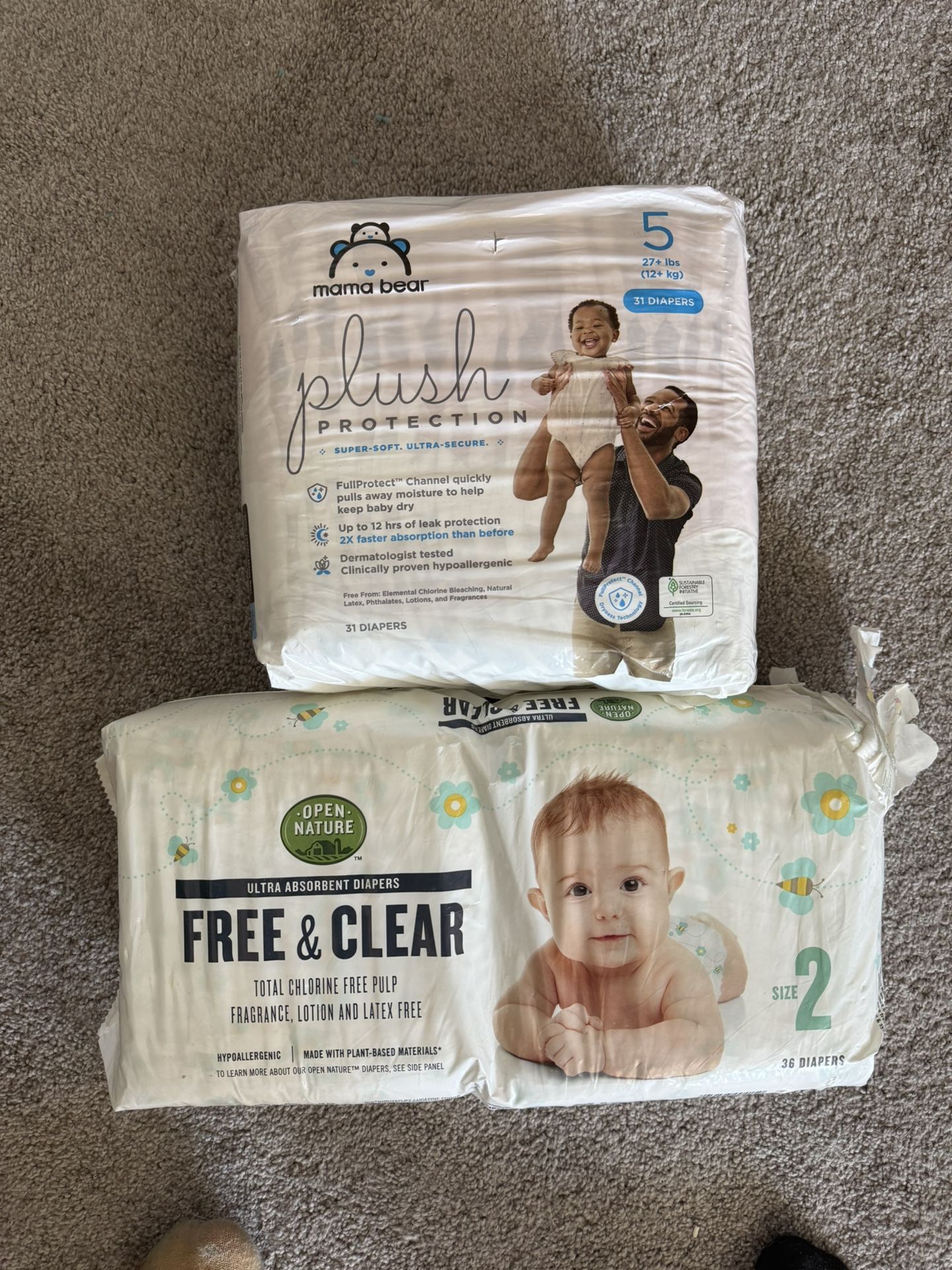 2 Packs Of Diapers