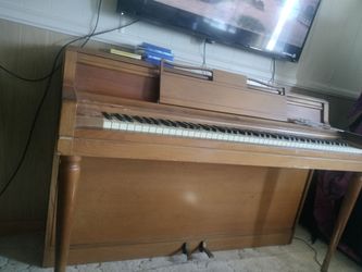 Free piano, but must pick up and move!