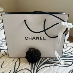 chanel shopping bag included flower and Ribbon . see pics for size.