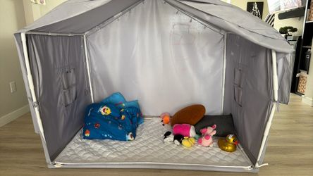 Kids play tent indoor with mat