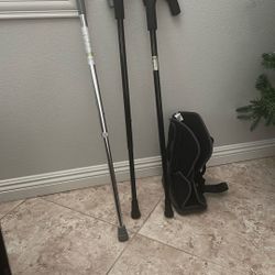 Walking Canes And A Boot