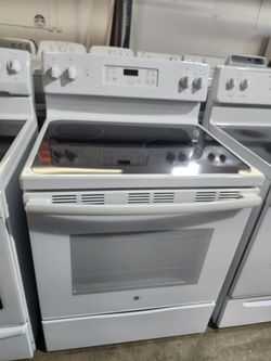 Estufa blanca de vidrio marca General Electric