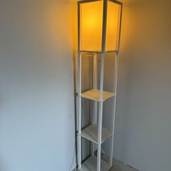 White wooden floor lamp with 3 shelves for decor 