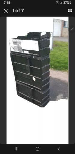 50x27x7 in Black storage box on 2 rolling wheels,Strap to lock,Local pickup