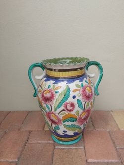 Vintage collectable vase has some chips