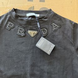 Prada T-shirt  women size M.  -   man S