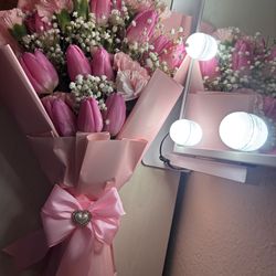 Pink tulips with pink carnations bouquet