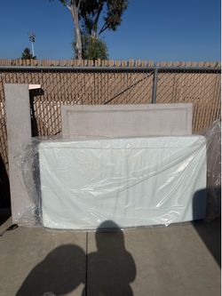 Twin mattress still in wrapping.