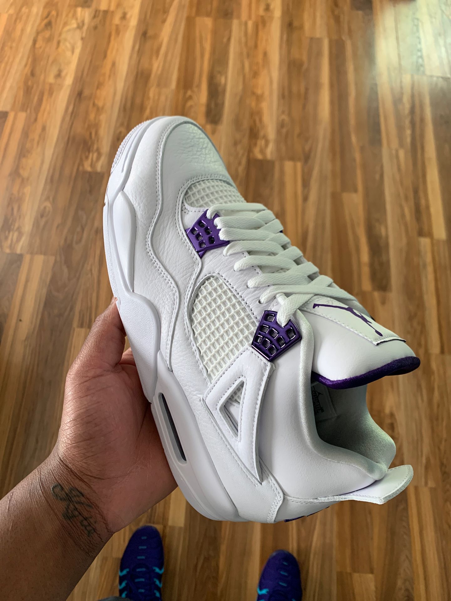 Jordan Retro 4 metallic purple