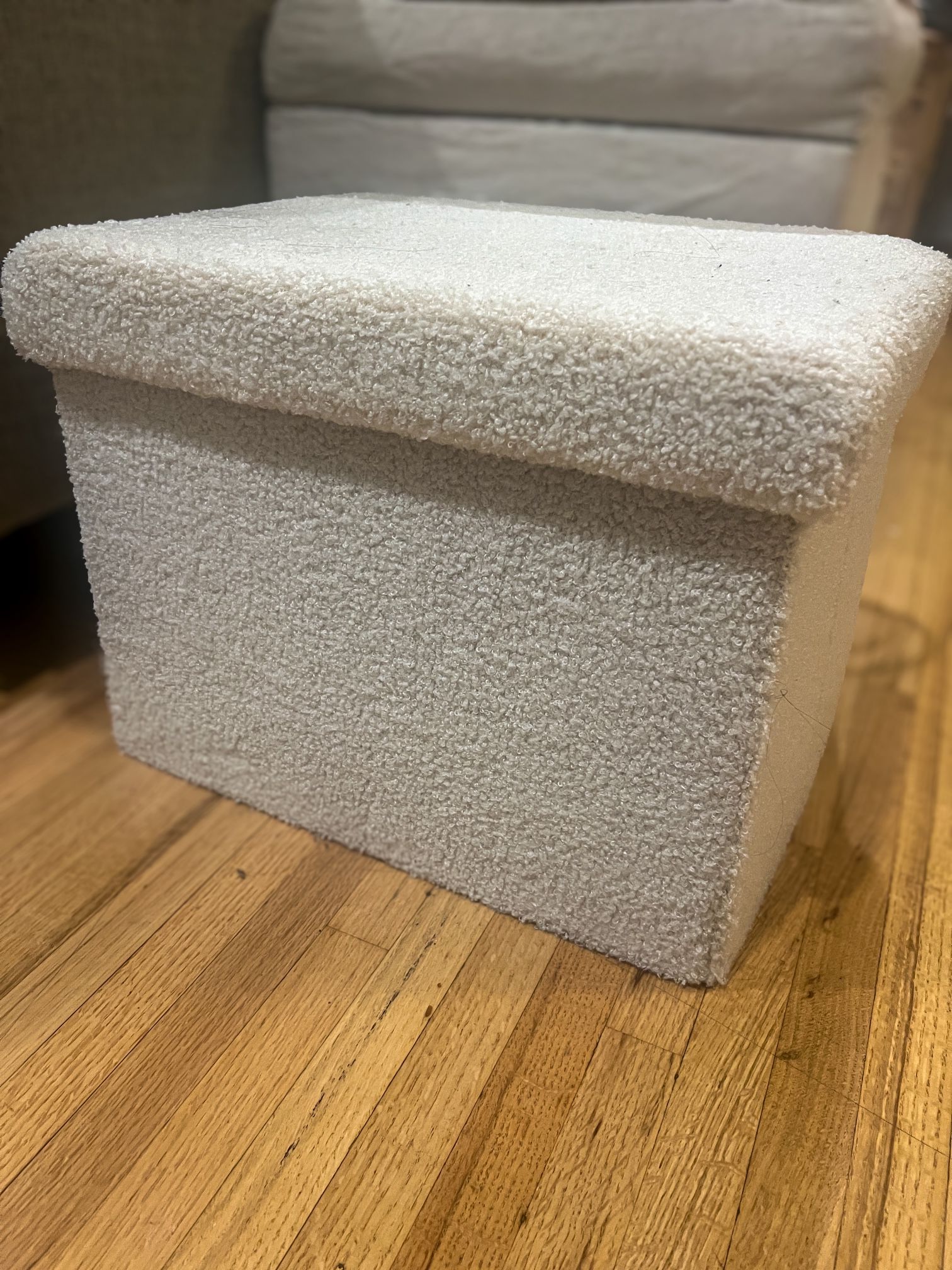 ivory bouclé ottoman / foot stool with storage
