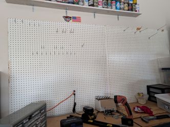 Pegboard with hooks and mant accessories