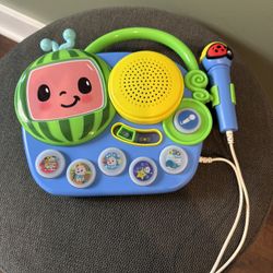 Cocomelon Toy Singalong Boombox with Microphone and Built-in Music, Toddler Toys for Fans of Cocomelon Gifts