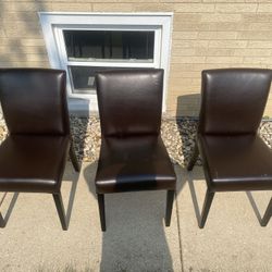 3 Brown leather chairs
