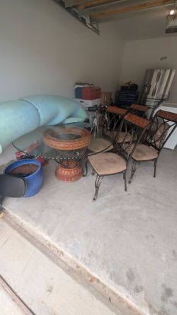Glass dinning table with chairs