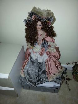 Unique vintage tall standing porcelain doll