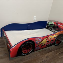 Almost brand new Toddler Cars Bed With Toddler Mattress 