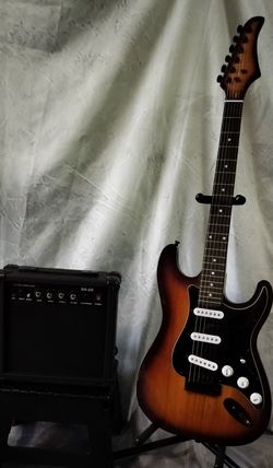 Like new electric guitar and new 20 watts amp