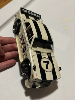 1:24 Diecast Muscle Machines Cream NISSAN SKYLINE GT-R 2000 No Box