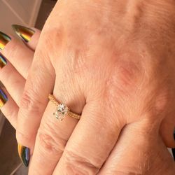 new 1 carat Oval solitaire Moissanite diamond ring.