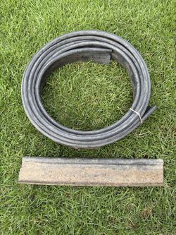 Black plastic lawn edging (35 feet long x 4 inches wide)