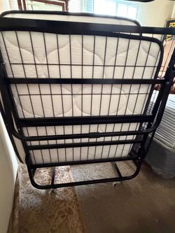 MUST GO. OBO Like new twin folding bed