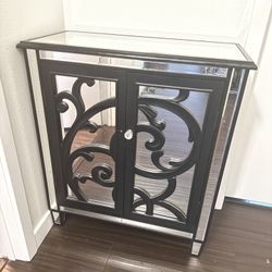 Z Gallerie Mirrored Accent Cabinet with Black Scrollwork Doors 28” wide x 13” deep