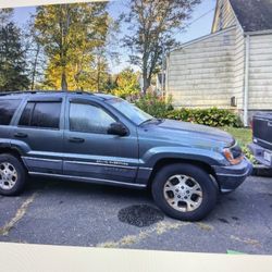 Jeep Cherokee, 2002, Green With Black Interior, 70,000 Miles On Engine. Needs Exhaust System And TLC. 1,800 Or Best Offer! Robert:  