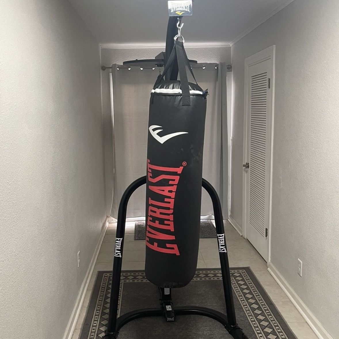 Everlast dual station punching bag stand with 100 lb powercore heavy bag and everhide speed bag online