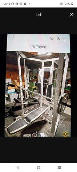 Smith machine missing a few bolts.