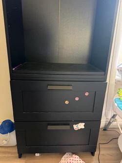 Black bookcase with 2 drawers on bottom