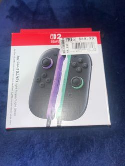 Nintendo switch 2 joycons brand new purple and green