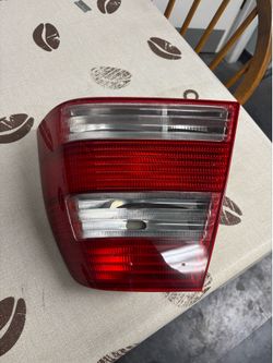 For Volkswagen Jetta passenger side taillight quarter