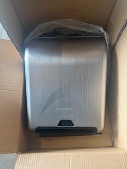 En motion paper  dispenser