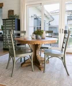 Like new Magnolia home round table with 4 chairs