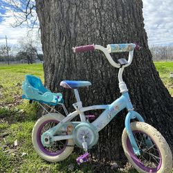 Disney Frozen 12 “ Little Girl’s Bike with Doll Carrier Sleigh, For Ages 2+, White, Blue, and Purple by Huffy