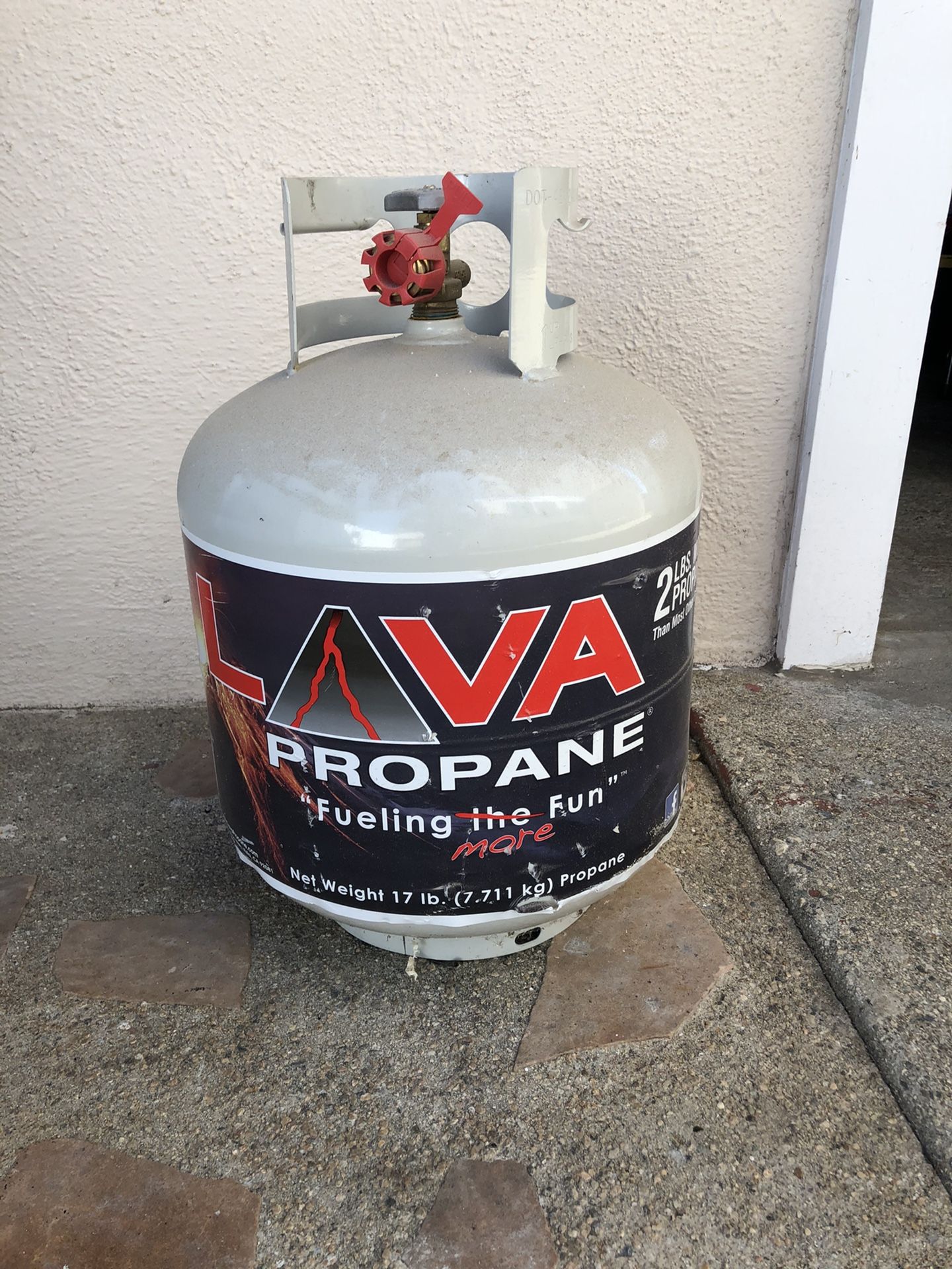 2 Lava 17 lb propane tanks 1 full with seal 1 ,1/2 full