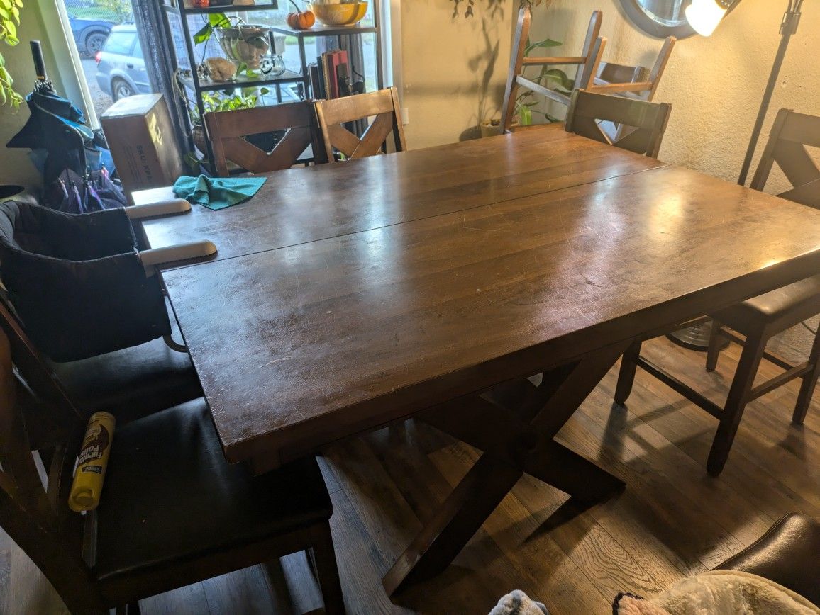 Bar Height Table And 8 Chairs.