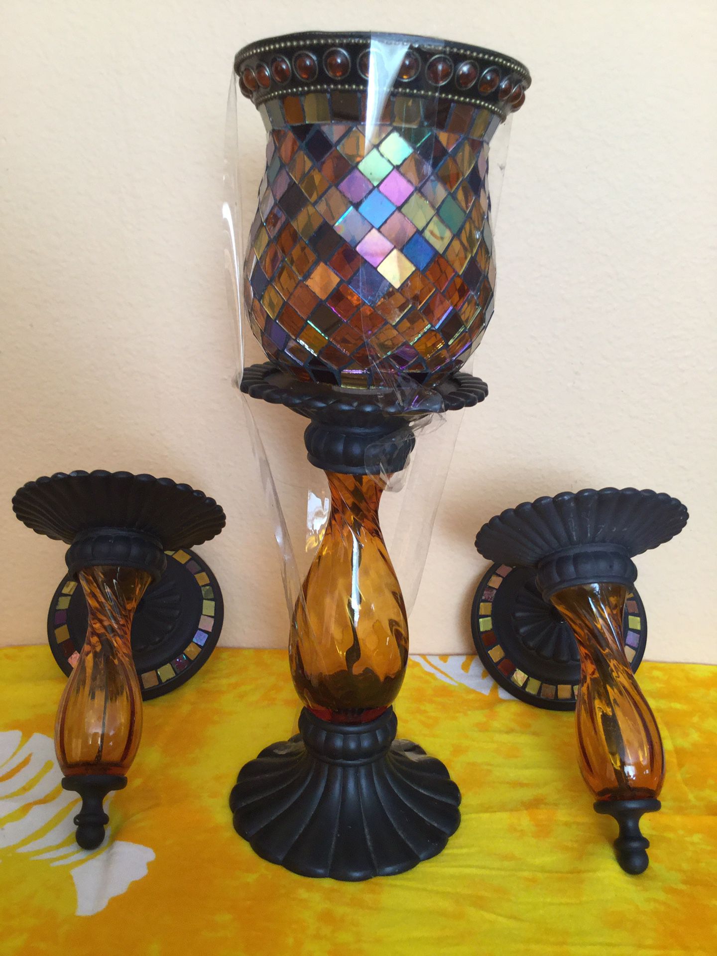 2 wall sconces and matching candle holder