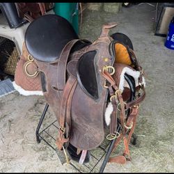 Saddle, Breast collar, Girth and saddle pad included (hardly used)