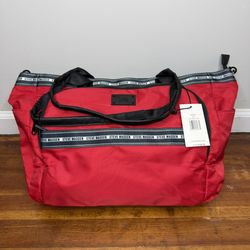 Steve Madden Red Handbag with Black Logo Plate