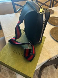 GG Black sling backpack in GG Supreme