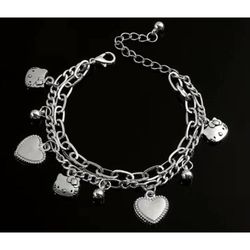SALE Hello Kitty Sanrio Silvertone Bracelet featuring Hello Kitty, Hearts, & Ball Charms
