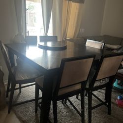 Dining table with seven chairs