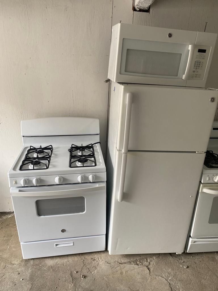 white stove ge microwave and fridge warranty. $750..sets