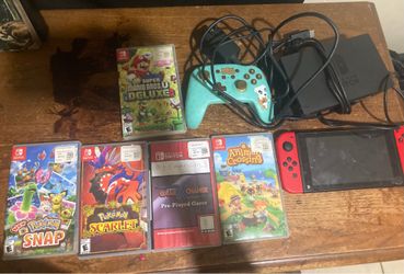 Nintendo switch with games and console