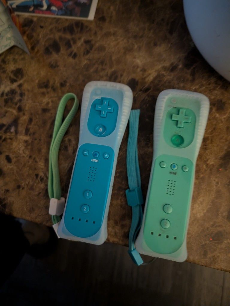 Two Wii Controllers With Guard 