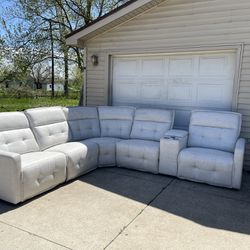 NEW Power reclining living room sectional with power adjustable headrests , usbs & wireless charger